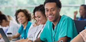 Photo: African American male healthcare student in class